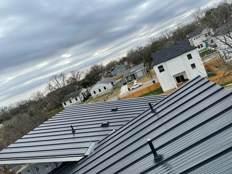 Standing seam metal roof panels with vents for Skylight Repair in Groton